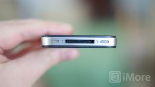 Remove the dock connector screws on your CDMA iPhone 4