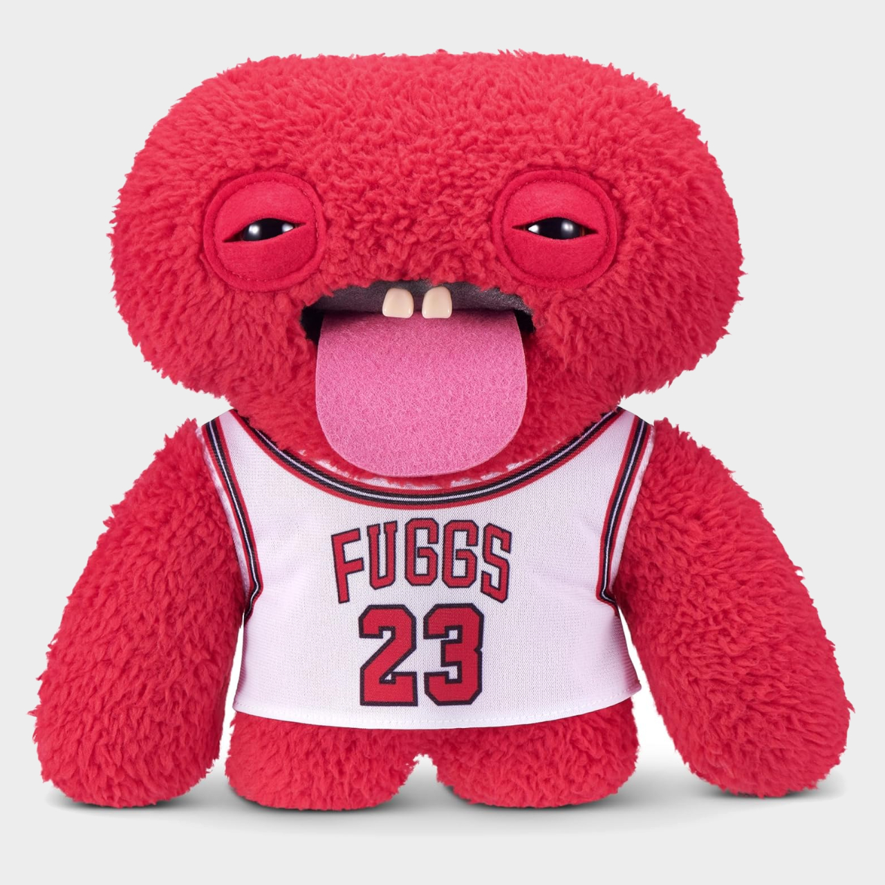 A red Fuggler plush against a plain background