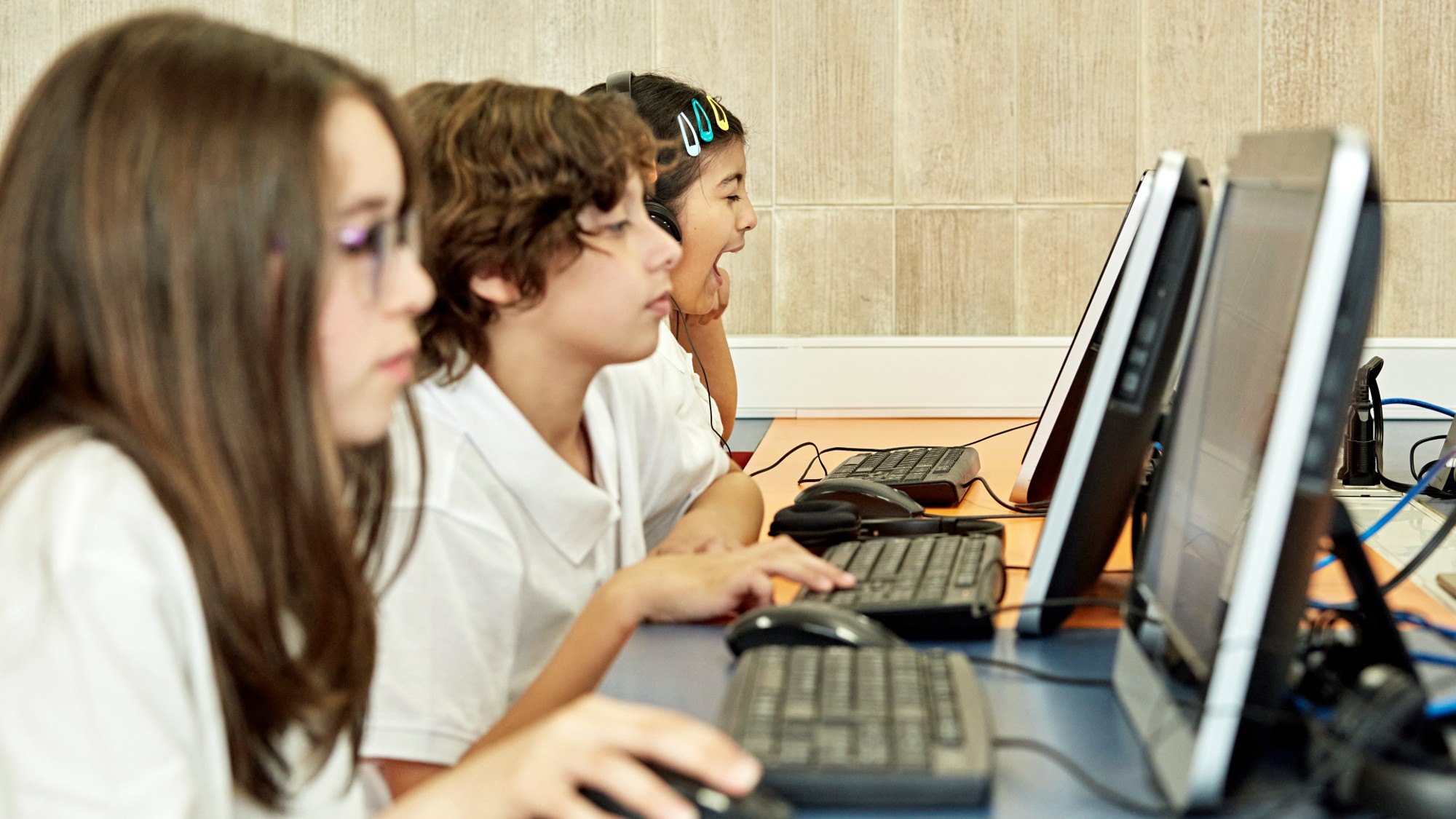 Children using a row of computers