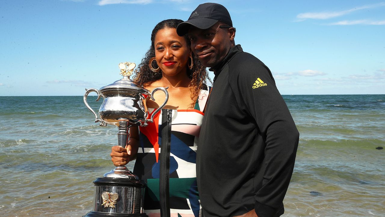 naomi&#039;s father leonard francois osaka with naomi osaka of japan posing with the daphne akhurst memorial cup during the women&#039;s australian open media opportunity at brighton beach on january 27, 2019 in melbourne, australia photo by julian finneygetty images