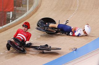 Frederik Madsen and Charlie Tanfield hit the deck after colliding in the men's team pursuit