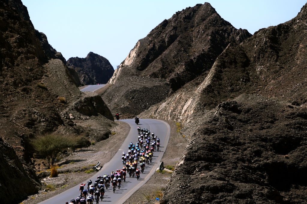 JABAL HATT OMAN FEBRUARY 13 A general view of the peloton passing through a landscape during the 12th Tour of Oman 2023 Stage 3 a 1518km stage from Al Khobar to Jabal Hatt 1000m TourofOman on February 13 2023 in Jabal Hatt Oman Photo by Alex BroadwayGetty Images