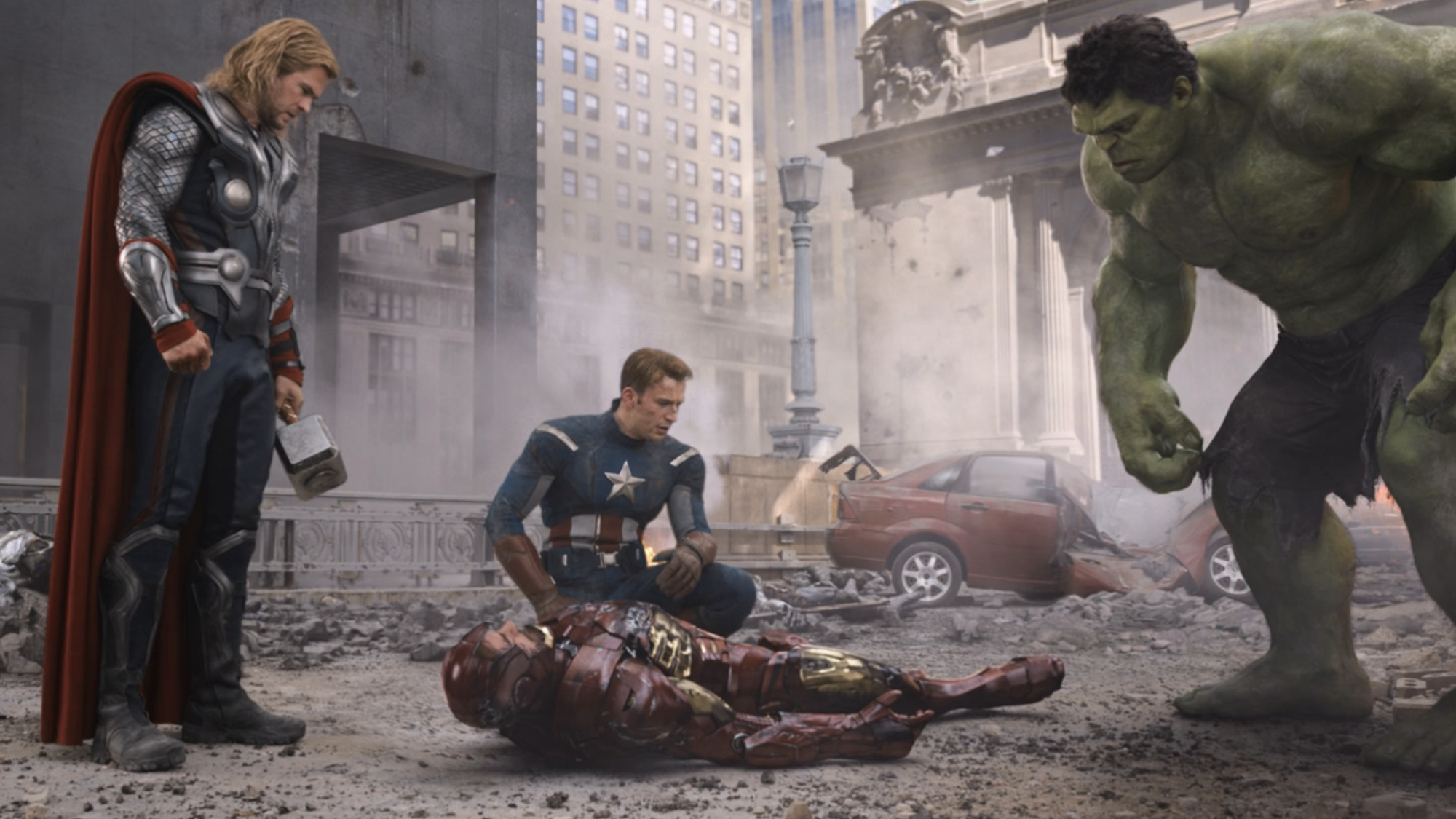 Earth's Mightiest Heroes stand around Iron Man in The Avengers.