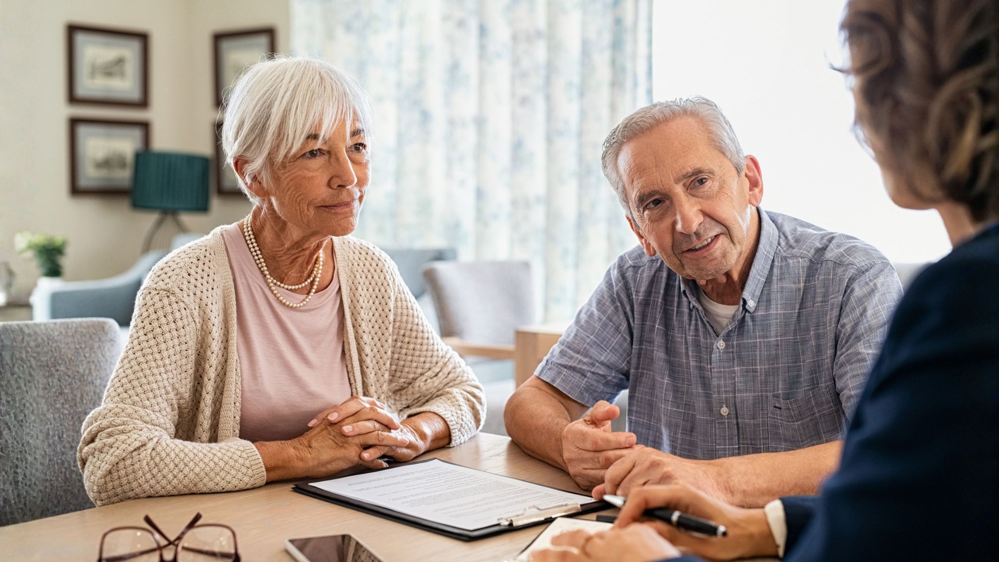 A couple reviewing their estate plan with a financial adviser