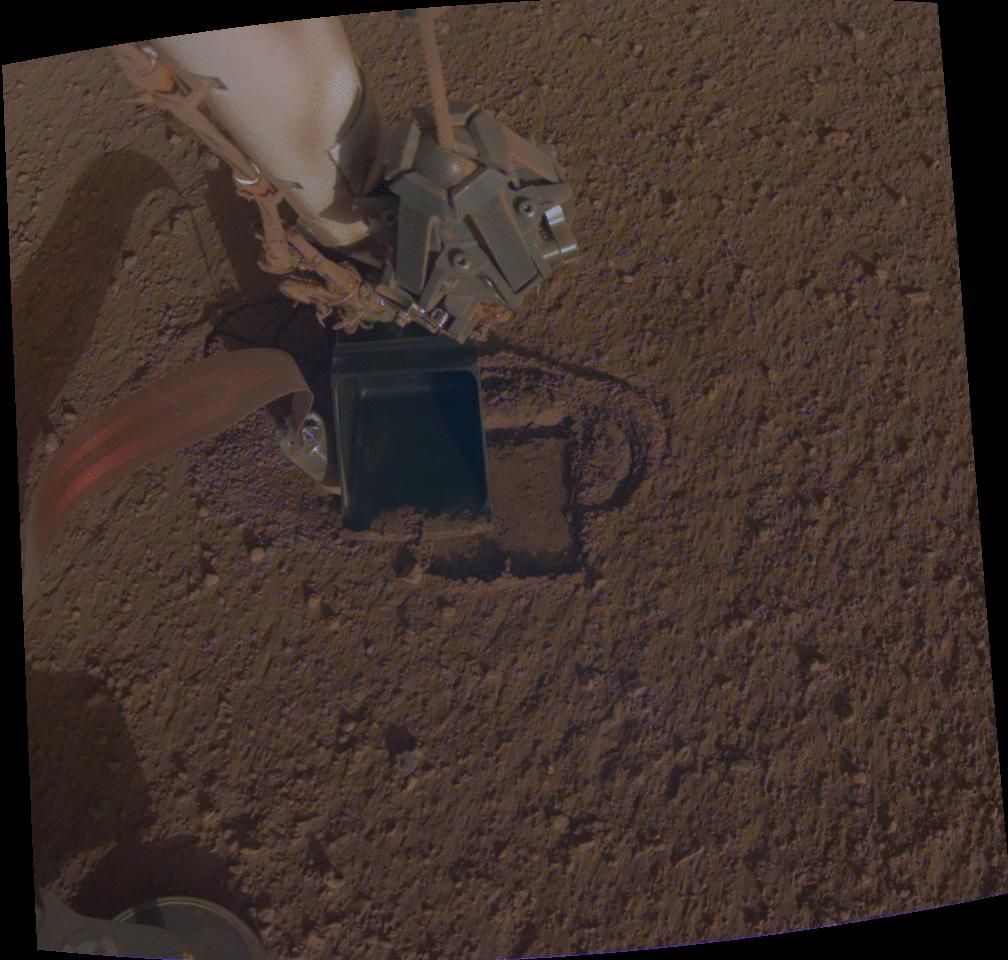 Scientists with NASA’s InSight Mars lander mission recently got the spacecraft’s burrowing heat probe moving again after “pinning” it with the lander’s soil scoop.