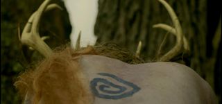Spiral body tattoo as seen in True Detective season 1