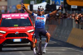 Team Soudal-Quick Step's French rider Julian Alaphilippe celebrates as he crosses the finish line to win the 12th stage of the 107th Giro d'Italia cycling race, 193km between Martinsicuro and Fano, on May 16, 2024. (Photo by Luca Bettini / AFP)