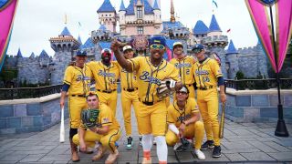Savannah Bananas in front of Sleeping Beauty Castle at Disneyland