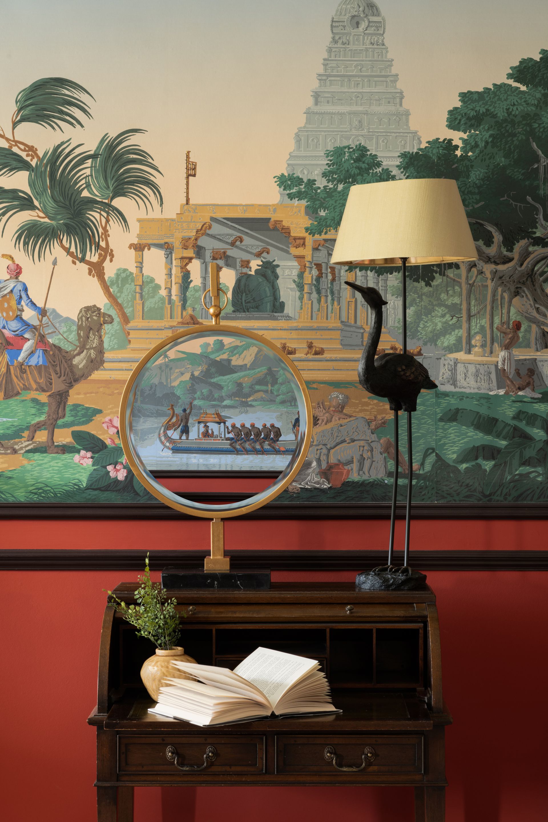 A home office with interesting wallpaper