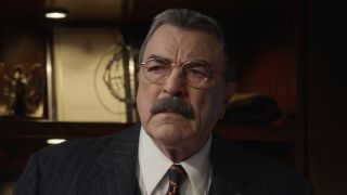 Frank Reagan concerned behind desk on Blue Bloods.