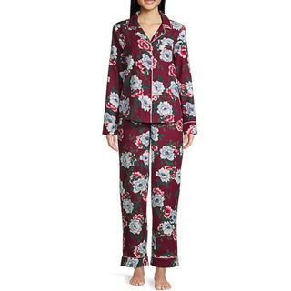 model wearing burgundy flannel pajama set with large floral print