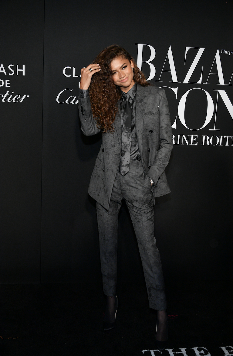 Zendaya wore a charcoal gray necktie to a Harper's Bazaar event in 2019