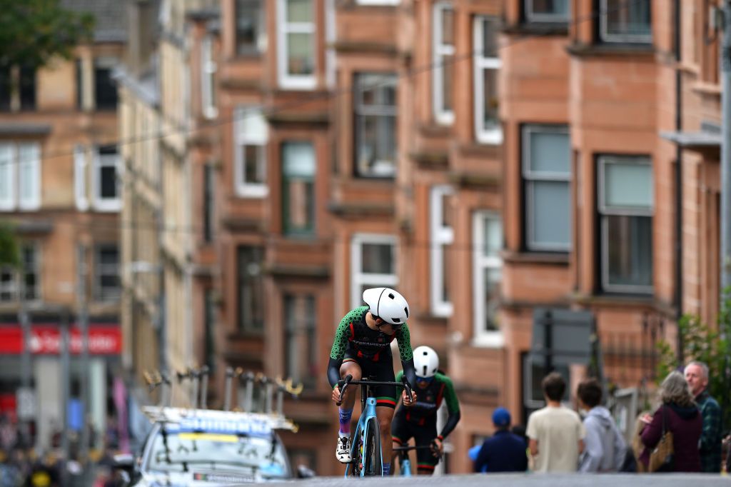 GLASGOW SCOTLAND AUGUST 08 Fariba Hashimi Yulduz Hashimi Zahra Rezayee and Team Afghanistan sprint during the Team Time Trial Mixed Relay a 403km race from Glasgow to Glasgow at the 96th UCI Cycling World Championships Glasgow 2023 Day 6 UCIWT on August 08 2023 in Glasgow Scotland Photo by Dario BelingheriGetty Images