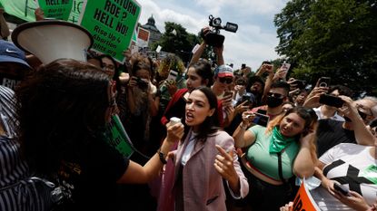 Rep. Alexandria Ocasio-Cortez (D-NY) speaks to abortion-rights activists .