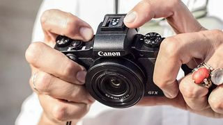 Canon PowerShot G1 X Mark III in someone's hands