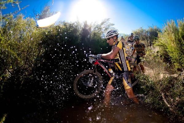 Splash'n'dash: Kevin Evans and Alban Lakata make their way across a river