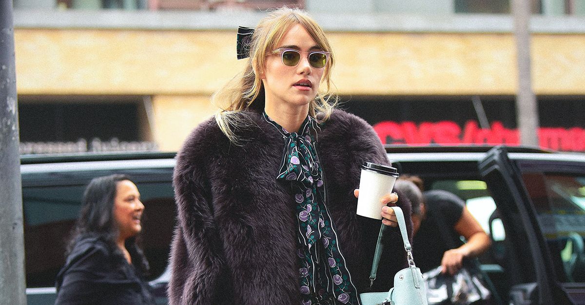 Suki Waterhouse Wore a Faux-Fur Jacket With Trendy Boots