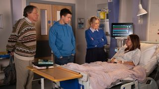 Roy Cropper, Ryan Connor and Lisa Swain at Carla Connor's hospital bedside.