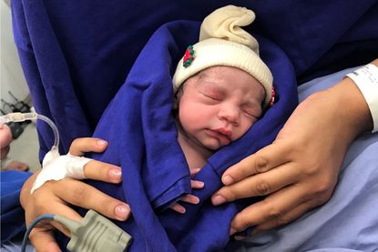 The baby girl born to a Brazilian woman with a transplanted uterus from a deceased donor.