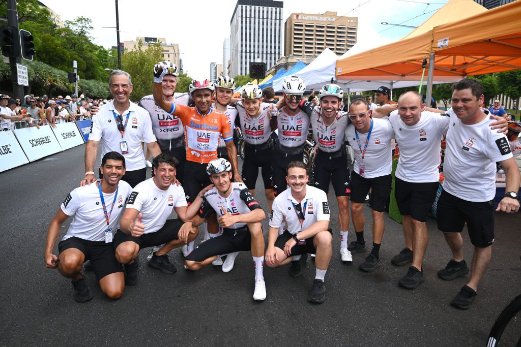 ADELAIDE AUSTRALIA JANUARY 26 Overall race winner Jhonatan Narvaez of Ecuador and UAE Team Emirates Xrg Orange Leader Jersey celebrates with his teammates Jay Vine of Australia Rune Herregodts of Belgium Julius Johansen of Denmark Rui Oliveira of Portugal Marc Soler of Spain Pablo Torres of Spain and staff members after the 25th Santos Tour Down Under 2025 Stage 6 a 90km stage from Adelaide to Adelaide UCIWT on January 26 2025 in Adelaide Australia Photo by Dario BelingheriGetty Images