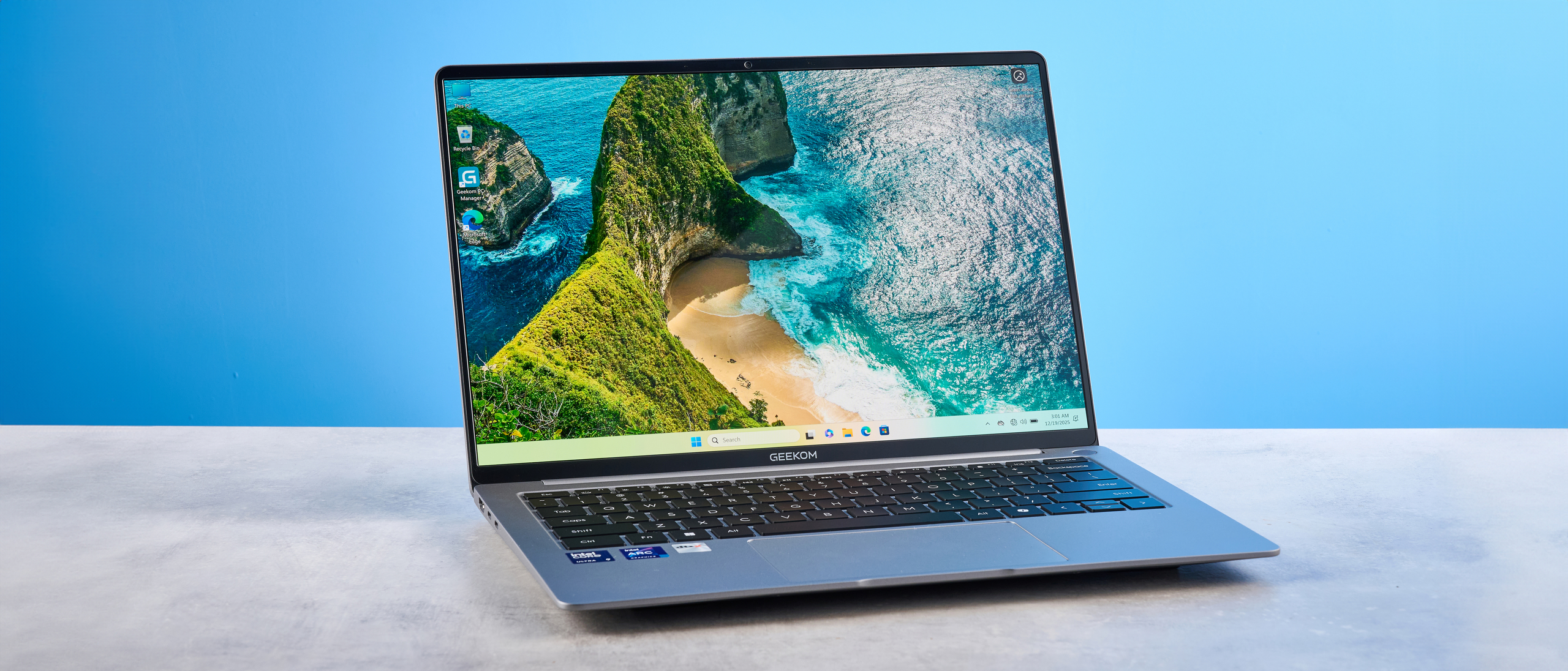 A silver Geekom GeekBook X14 Pro Windows laptop