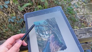 XPPen Magic Pad review; a tablet resting on a wooden bridge