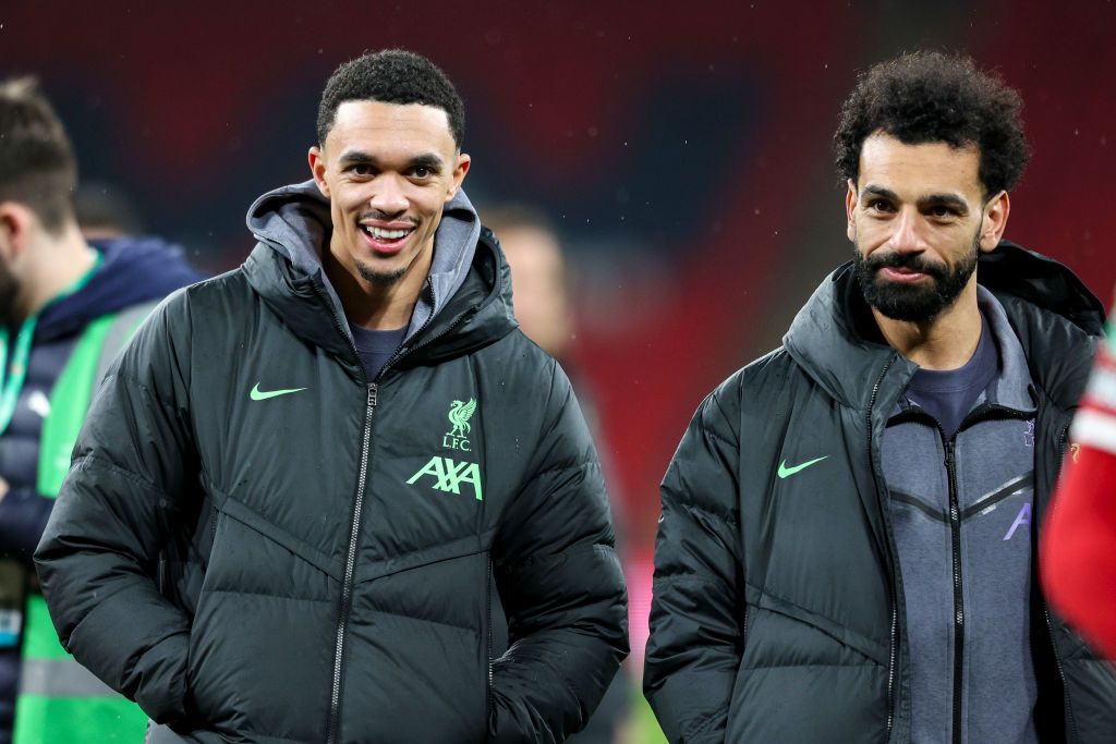 Trent Alexander-Arnold and Mohamed Salah of Liverpool who couldn&#039;t play because of injury after their sides 1-0 win in extra-time during the Carabao Cup Final match between Chelsea and Liverpool at Wembley Stadium on February 25, 2024 in London, England. 