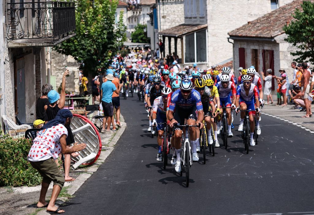 The pack of riders cycles during the 19th stage of the 109th edition of the Tour de France cycling race 1883 km between CastelnauMagnoac and Cahors in southwestern France on July 22 2022 Photo by Thomas SAMSON AFP Photo by THOMAS SAMSONAFP via Getty Images