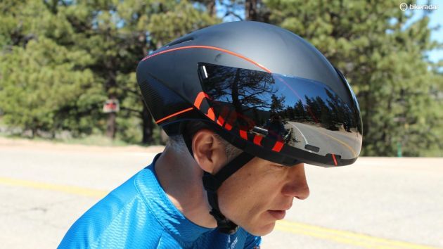 The shield snaps into place on top of the helmet as well