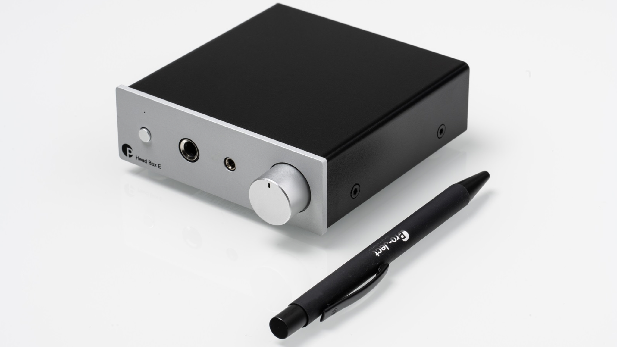 The Pro-Ject Head Box E headphone amplifier on a white background