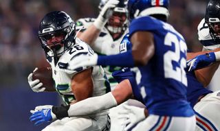 Zach Charbonnet #26 of the Seattle Seahawks carries the ball during the third quarter of an NFL football game against the New York Giants at MetLife Stadium on October 2, 2023 