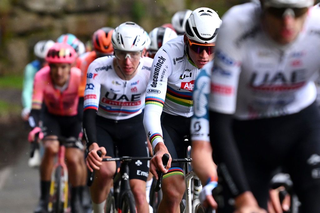 LIEGE BELGIUM APRIL 24 EDITORS NOTE Alternate crop LR Tadej Pogacar of Slovenia and UAE Team Emirates and Mathieu van der Poel of The Netherlands and Team Alpecin Deceuninck compete during the 110th Liege Bastogne Liege 2024 Mens Elite a 2545km one day race from Liege to UCIWT on April 24 2024 in Liege Belgium Photo by Dario BelingheriGetty Images