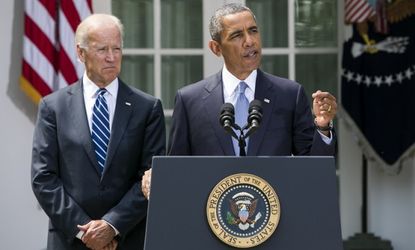 President Barack Obama is joined by Vice President Joe Biden as he delivers a statement on Syria in the Rose Garden of the White House on August 31.