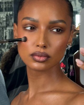 Model Jasmine Tookes wearing makeup by Leah Darcy.