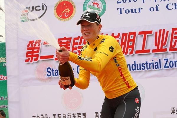 on the podium at Stage 2 of Tour of Chongming Island in the leader's yellow jersey New race leader, Kirsten Wild (Cervelo Test Team)