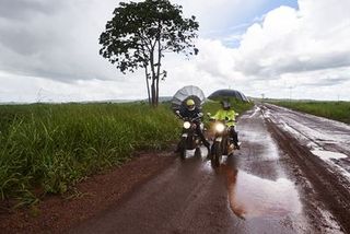 Motorcycle, Road, Road surface, Infrastructure, Asphalt, Motorcycling, Plain, Auto part, Soil, Rural area,
