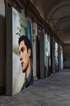 Photographs arranged around the arcades of the Milanese academy's inner courtyard