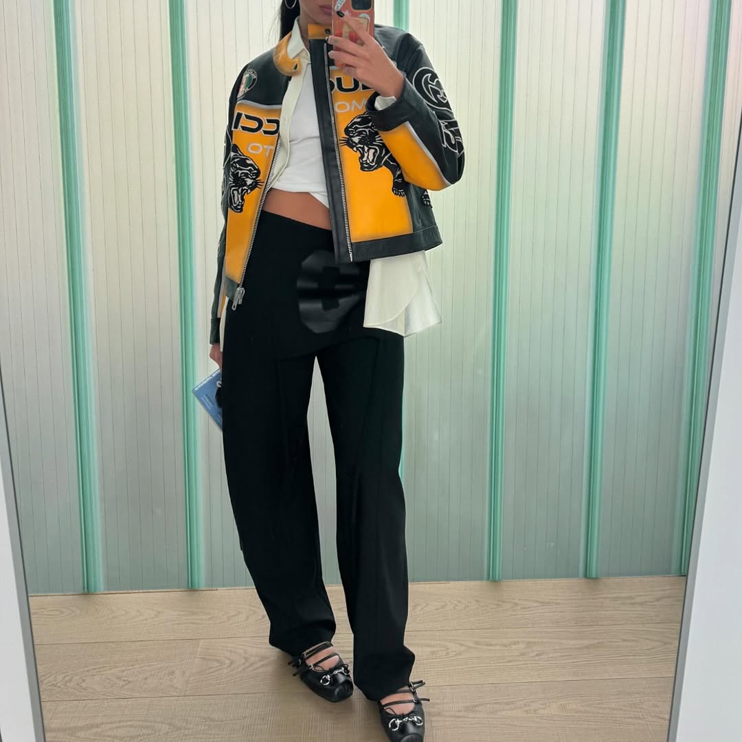 dua lipa wears gucci pointe shoes and a racing jacket