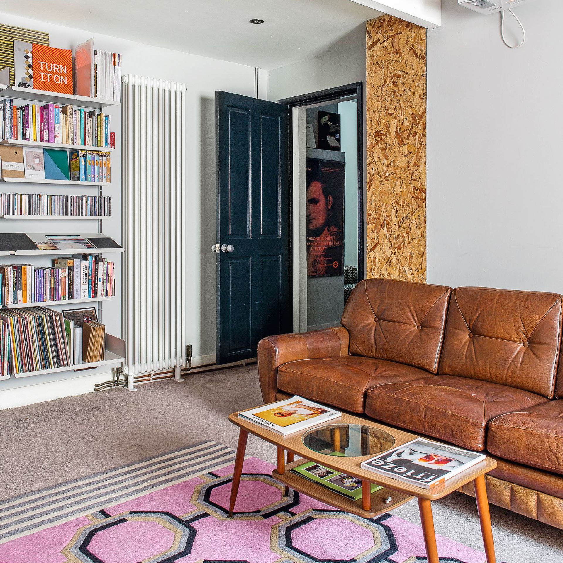 Living room with vintage leather sofa and coffee table