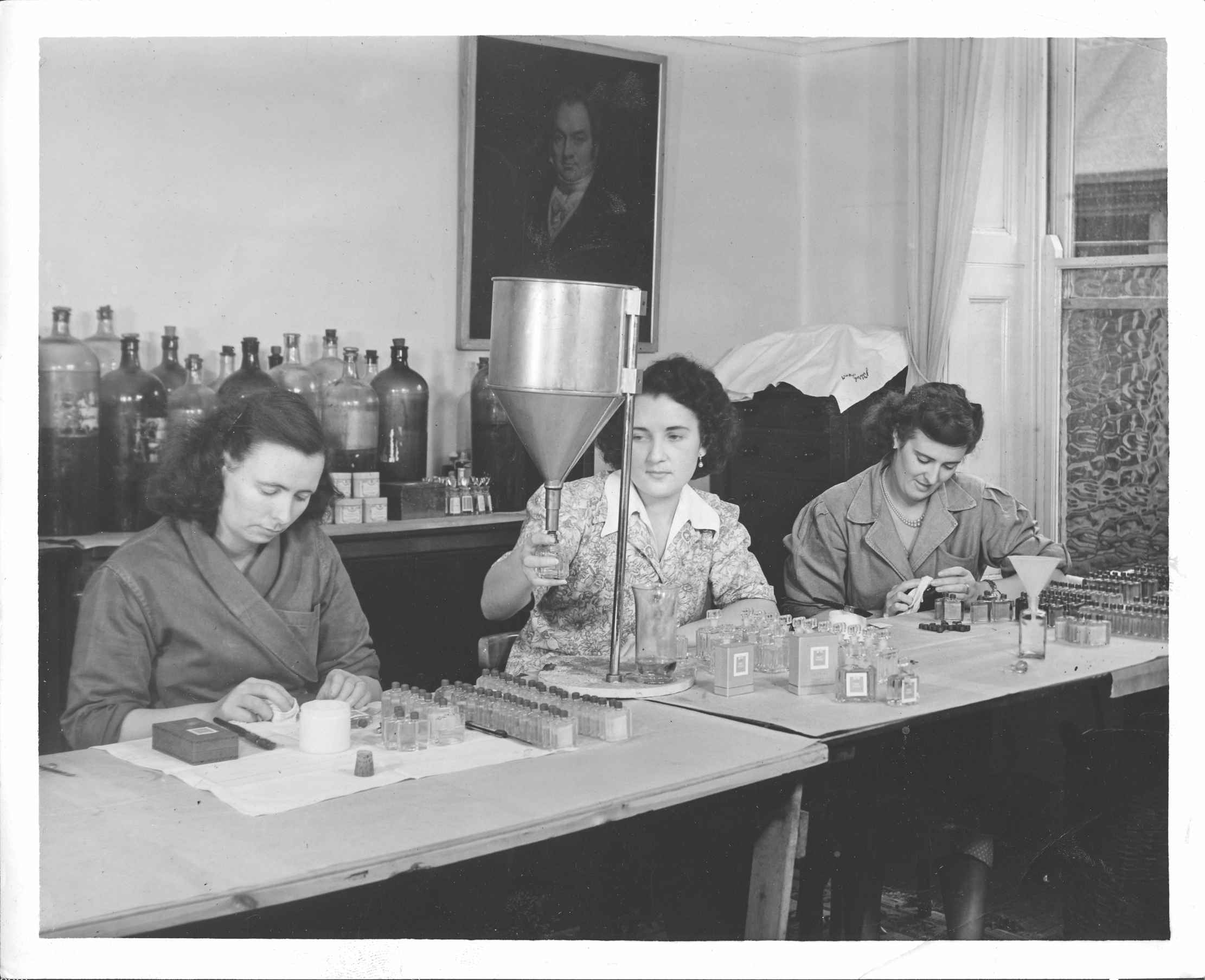 Women fill up Floris bottles at some point in the 1940s.