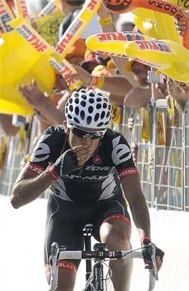 Carlos Sastre (Cervelo Test Team) has time to enjoy his win.