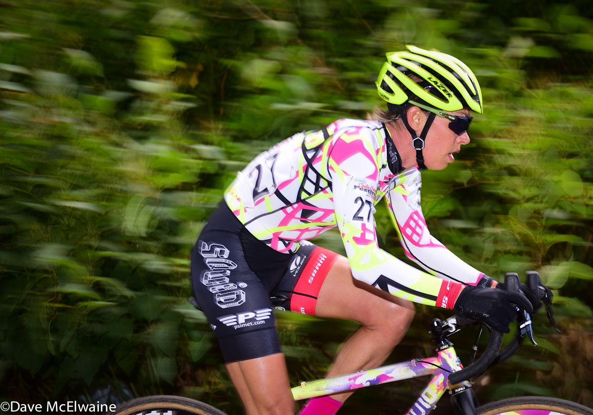 Emily Kachorek (Squid Bikes) streaking through the woods on her final lap