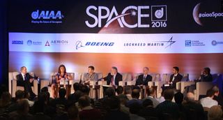 The panelists at the "Next Stop: Mars" plenary session at the AIAA SPACE 2016 meeting in Long Beach, California. The speakers discussed how NASA, along with commercial and international partners, is pursuing human missions to Mars.