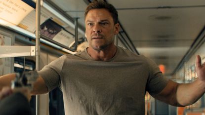 Jack has a gun pointed at him on a subway carriage