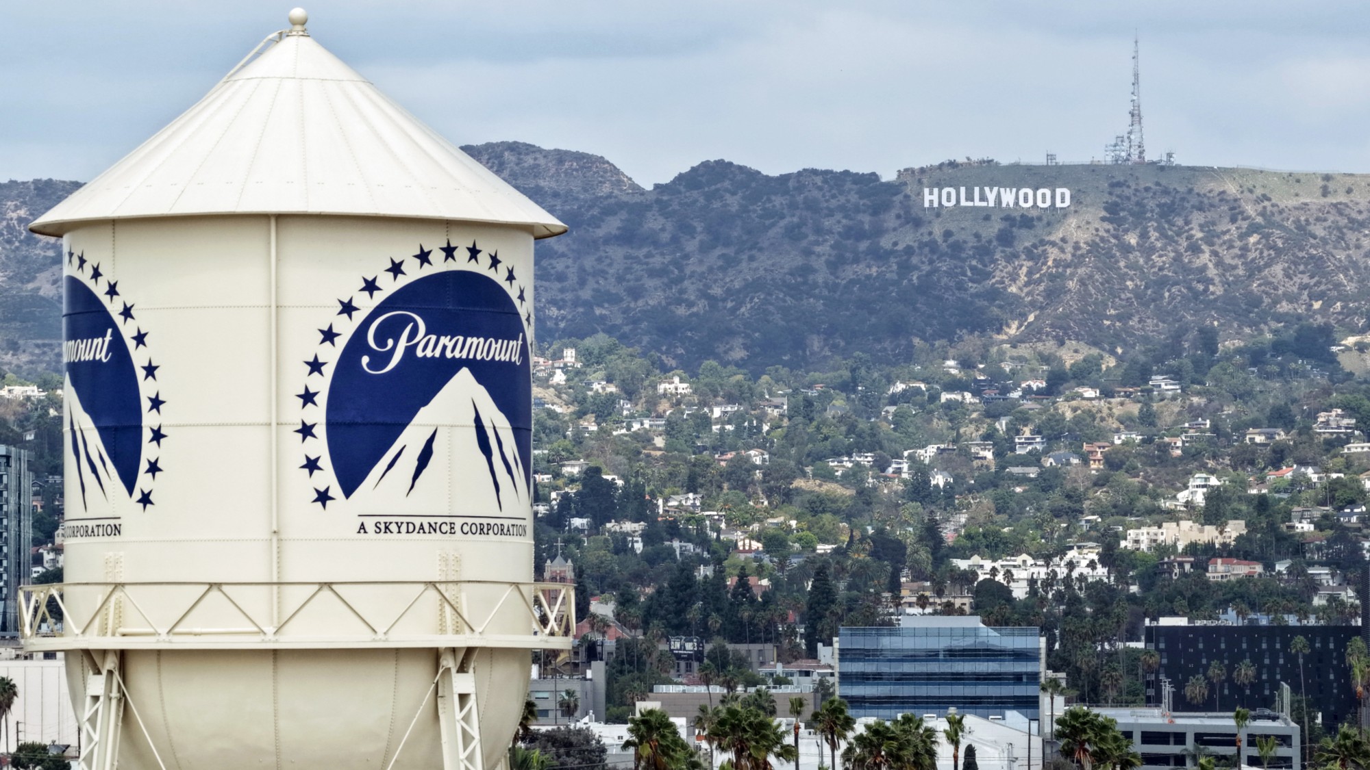 The Paramount water tower in front of the Hollywood Hills. 