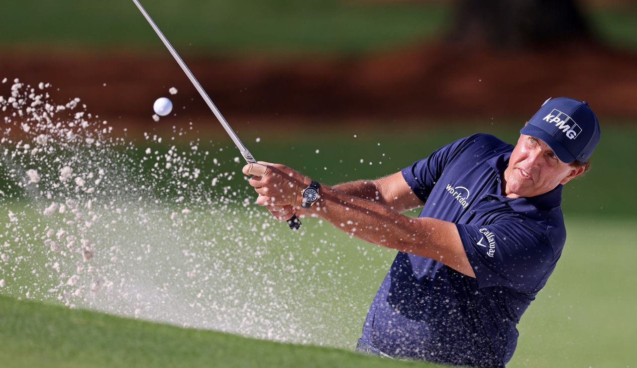 Mickelson hits a bunker shot