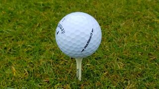 Callaway Warbird Golf Ball teed up on the golf course