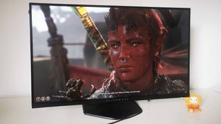 Alienware AW2724HF monitor with Karlach from Baldur's Gate 3 on screen