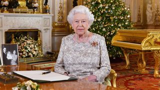 LONDON, UNITED KINGDOM - DECEMBER 24: Queen Elizabeth II poses for a photo after she recorded her annual Christmas Day message, in the White Drawing Room at Buckingham Palace in a picture released on December 24, 2018 in London, United Kingdom.