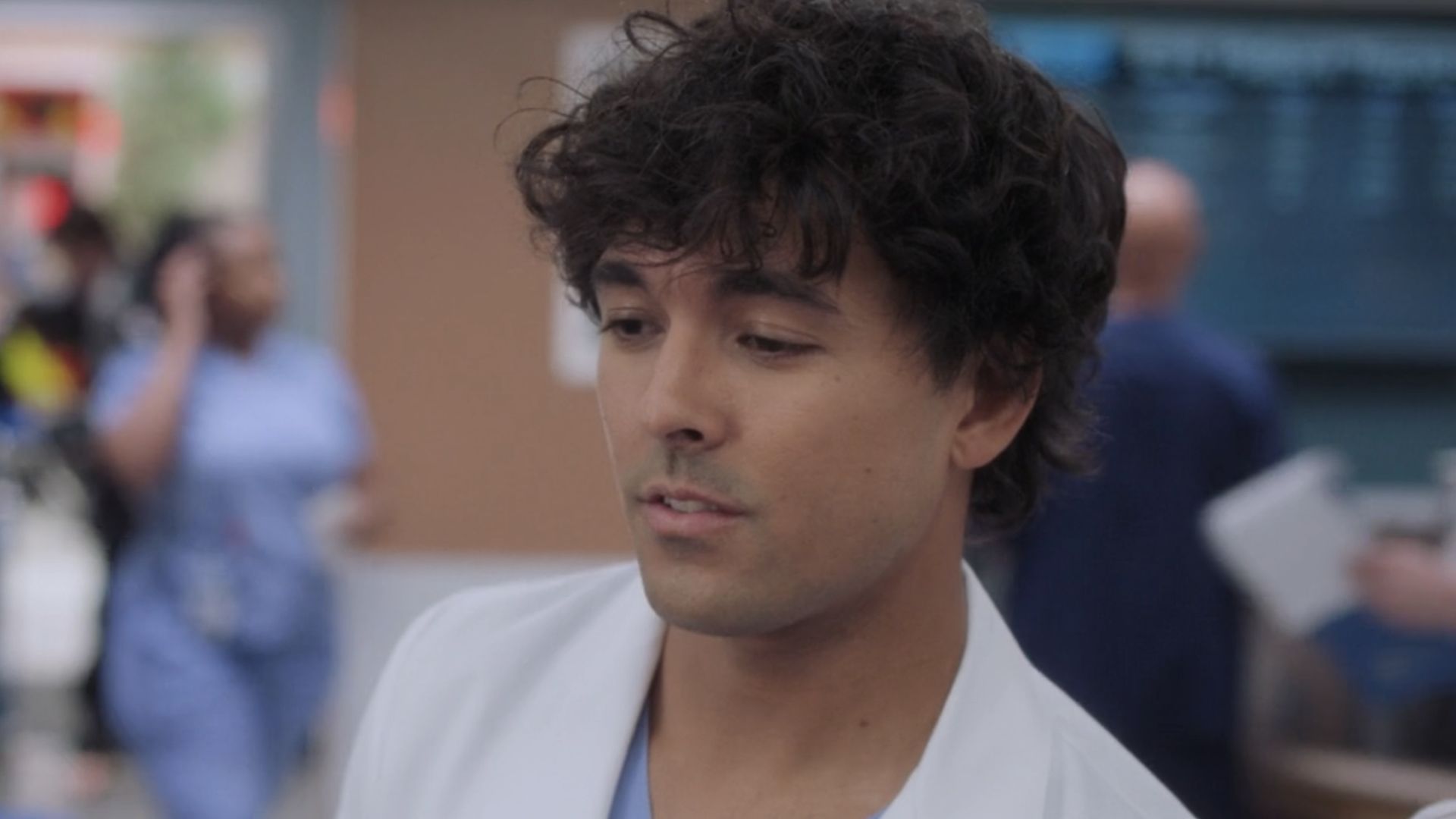 Adams in the OR giving a neuro exam.